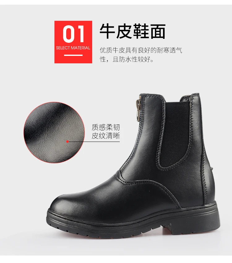 Black leather boot with a zipper on a gray surface . Ghoddosh