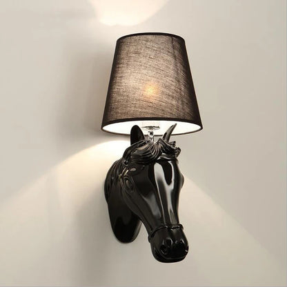 Wall-mounted lamp with horse head design and black shade on a light gray background @ ghoddosh.com