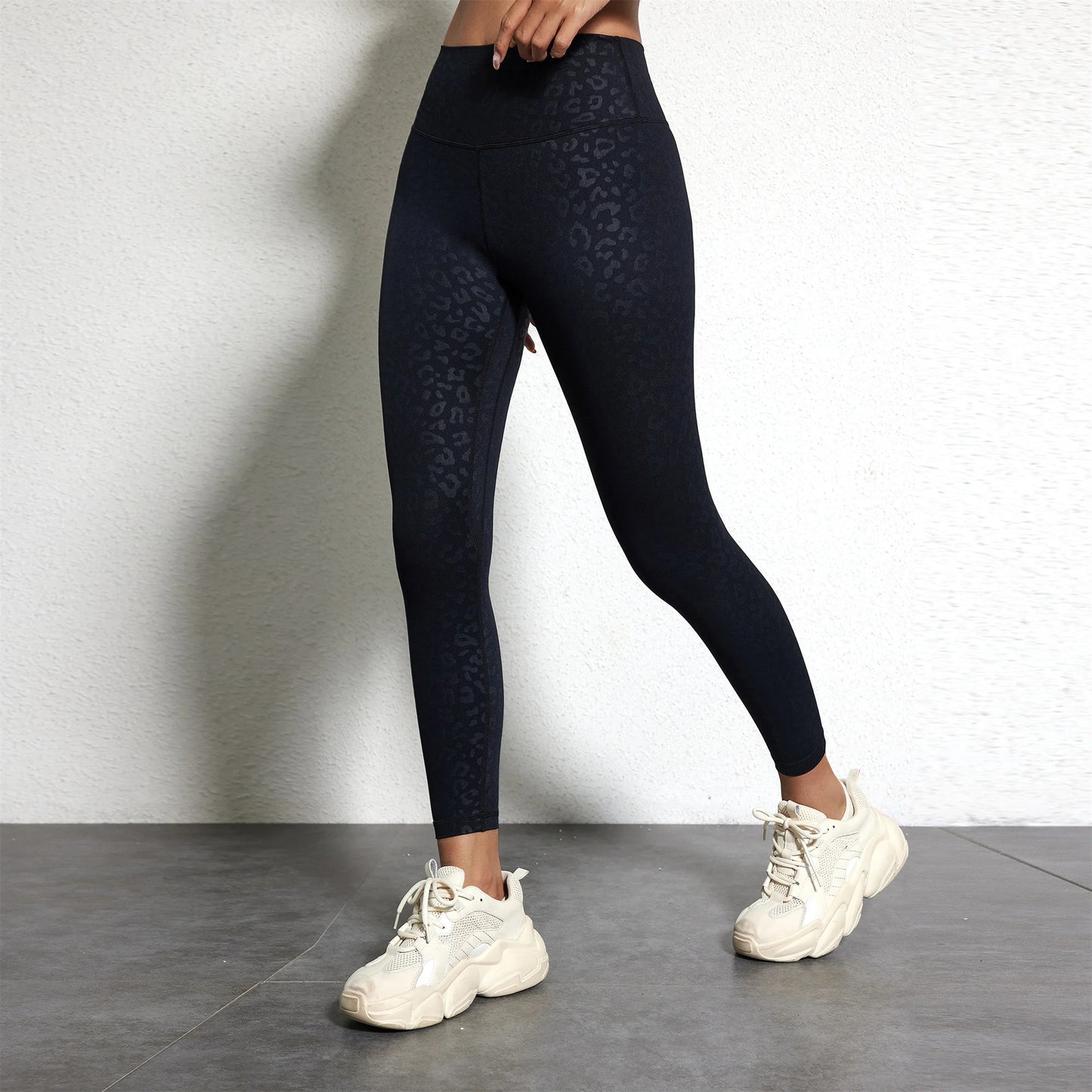 A Model wearing leggings  - Solid Color Classic Soft High Waist Legging  - Women  Sports  Athletic Pants / ghoddosh.com