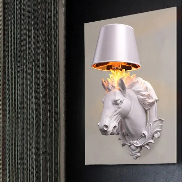 Decorative wall light with horse head design on a dark wall. @ ghoddosh.com
