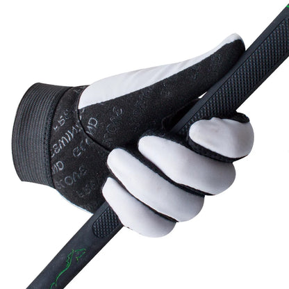 Black and white glove holding a black strap on a white background . Ghoddosh 