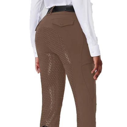 Brown equestrian pants with a white shirt on a white background .Ghoddosh 