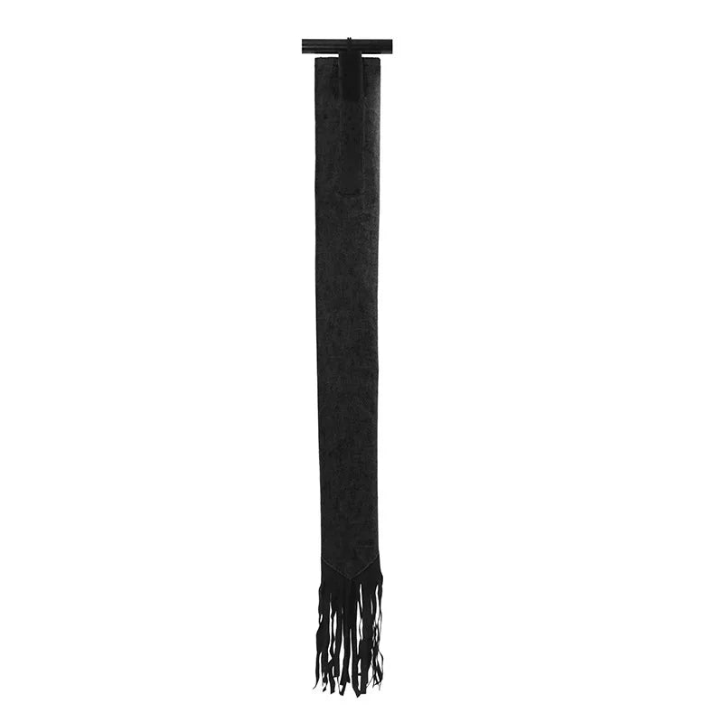 A Colored horse tail bag attached to a horse's tail, with  fringes. Ghoddosh