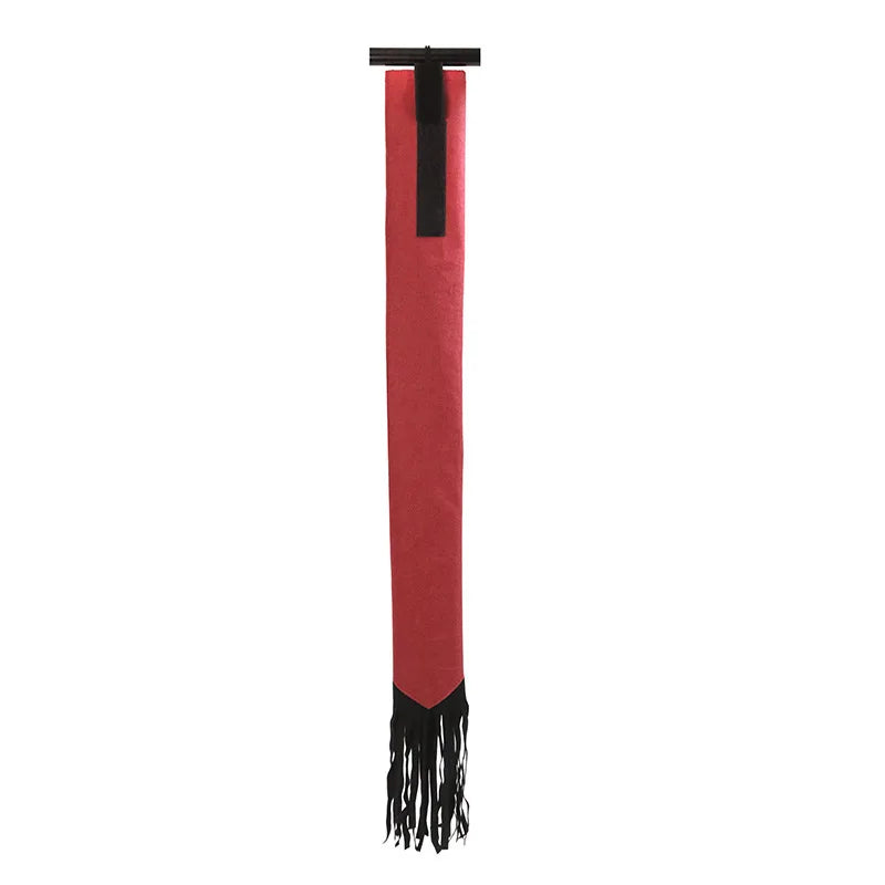 A Colored horse tail bag attached to a horse's tail, with  fringes. Ghoddosh