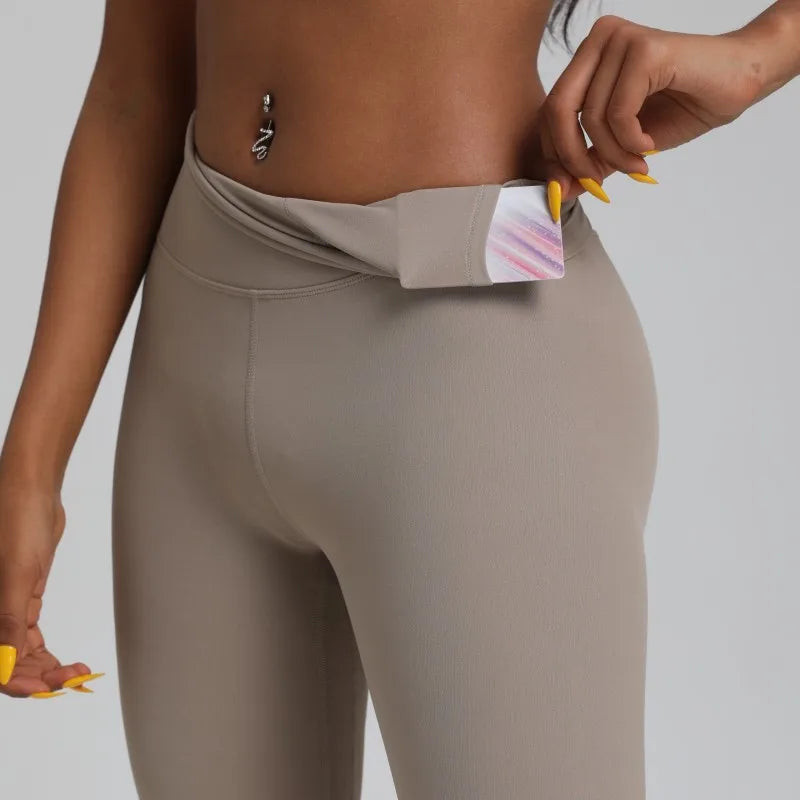 A Model wearing leggings  - Solid Color Classic Soft High Waist Legging  - Women  Sports  Athletic Pants / ghoddosh.com