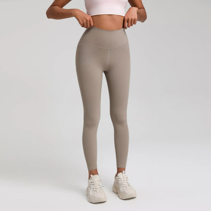 A Model wearing leggings  - Solid Color Classic Soft High Waist Legging  - Women  Sports  Athletic Pants / ghoddosh.com