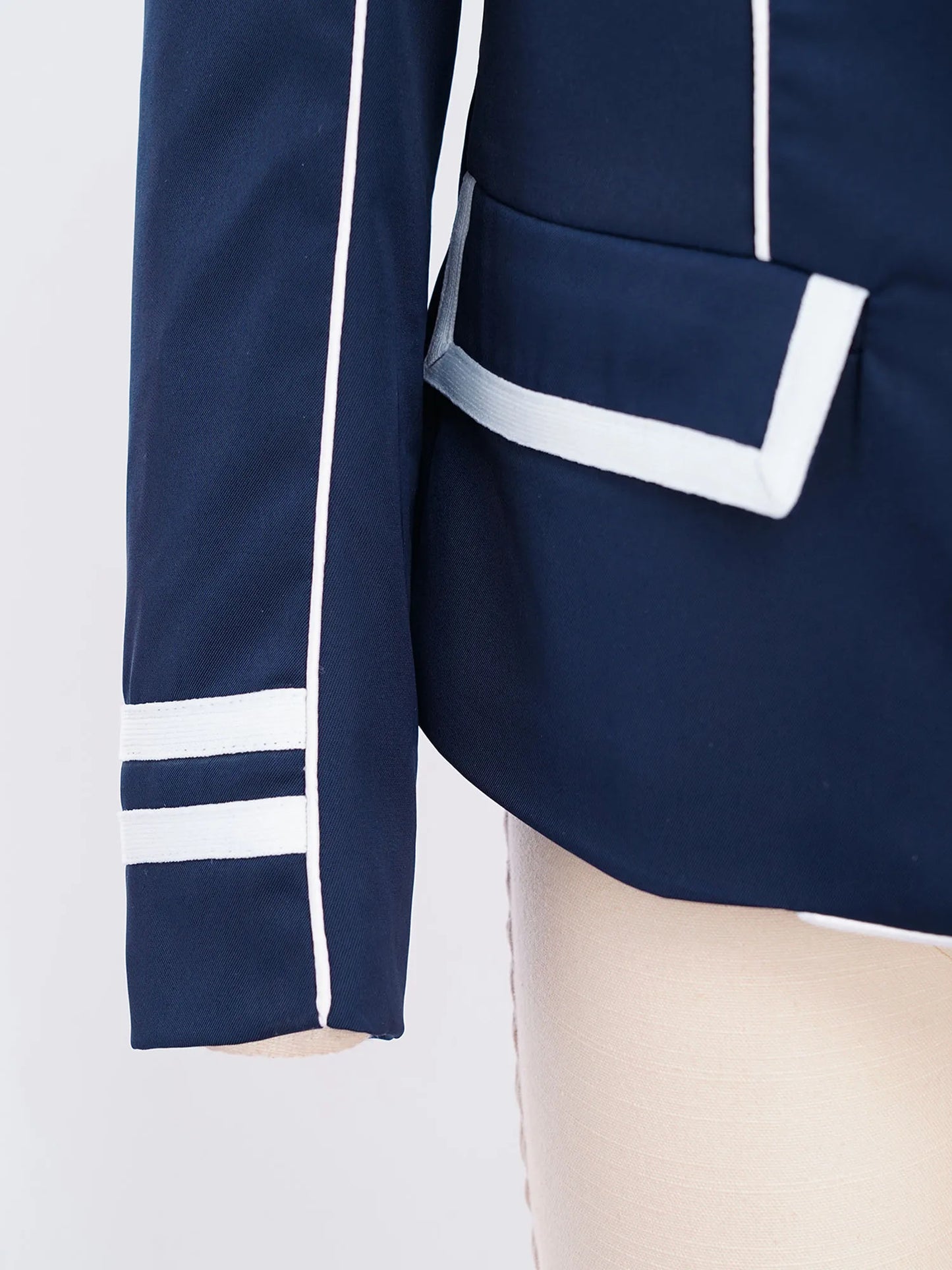 Navy blue outfit with white trim on a light background @ ghoddosh.com