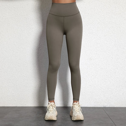 A Model wearing leggings  - Solid Color Classic Soft High Waist Legging  - Women  Sports  Athletic Pants / ghoddosh.com
