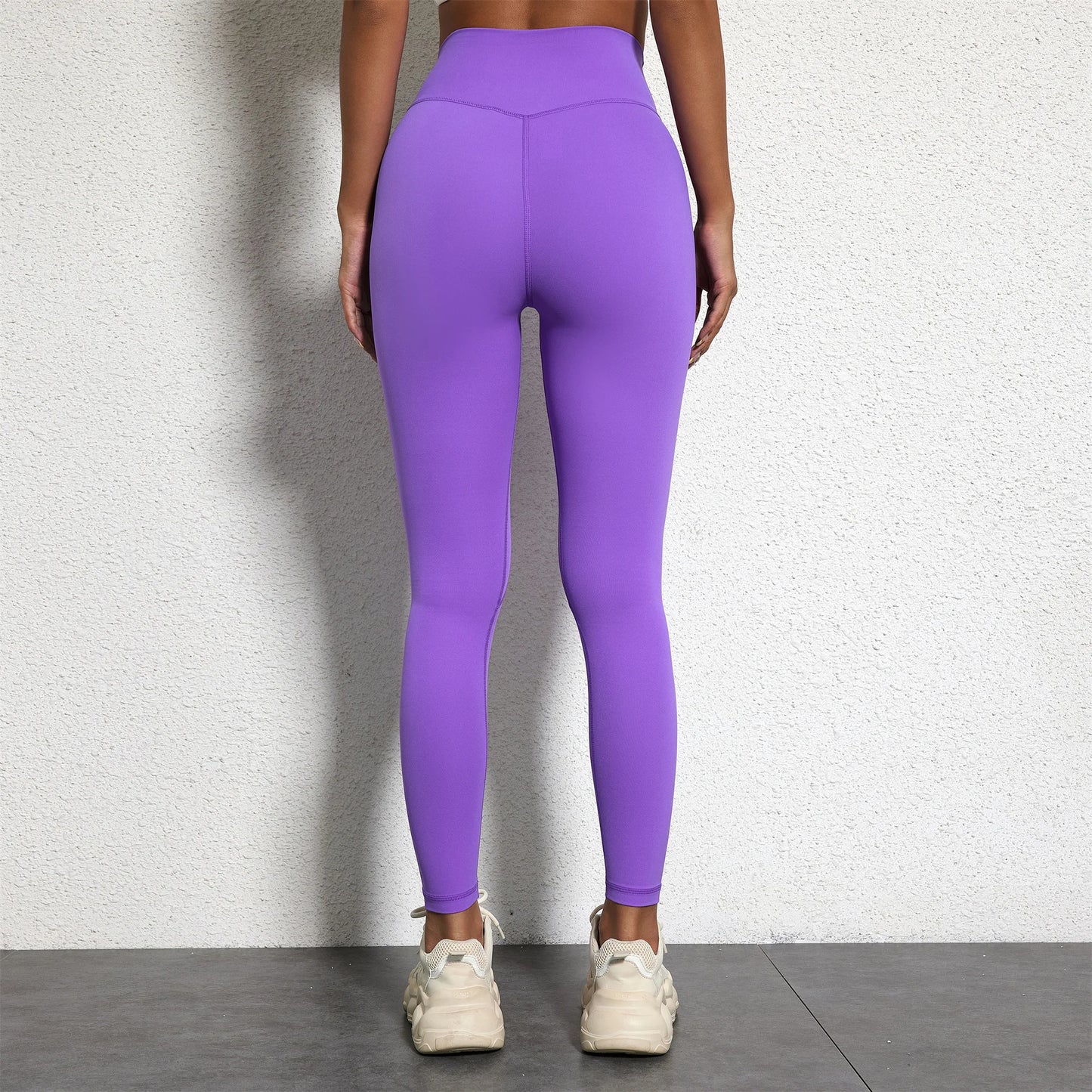 Person wearing bright pink leggings  - Solid Color Classic Soft High Waist Legging  - Women  Sports  Athletic Pants / ghoddosh.com
