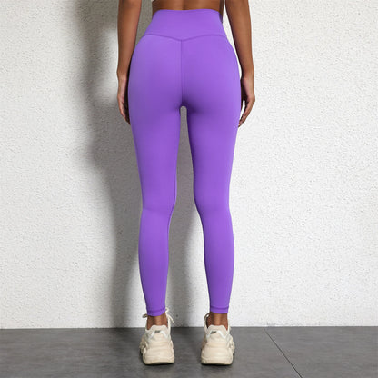 Person wearing bright pink leggings  - Solid Color Classic Soft High Waist Legging  - Women  Sports  Athletic Pants / ghoddosh.com