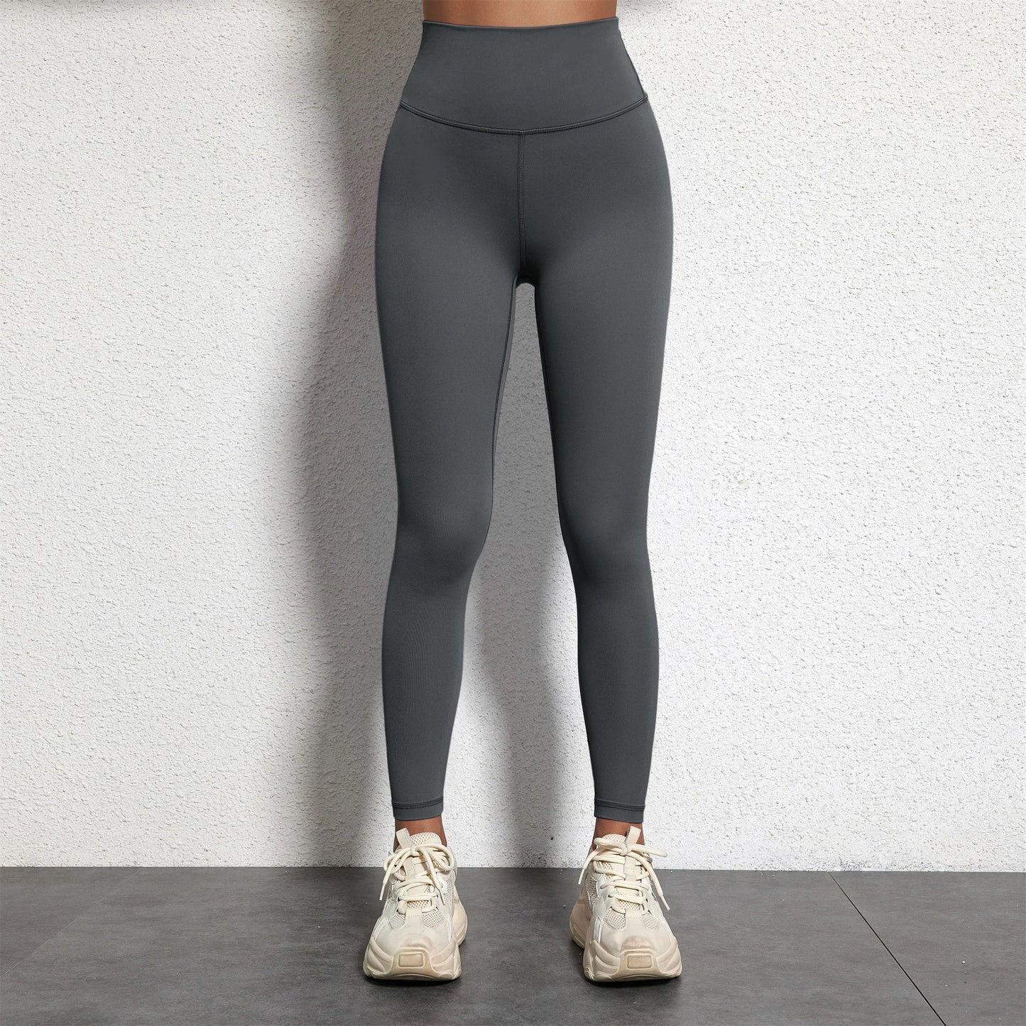 A Model wearing leggings  - Solid Color Classic Soft High Waist Legging  - Women  Sports  Athletic Pants / ghoddosh.com