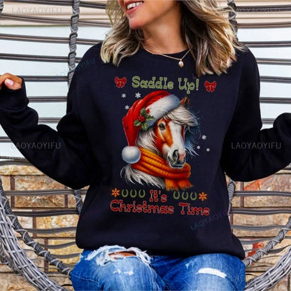 Person wearing a navy blue sweater with a Christmas-themed horse design and text. ghoddosh.com