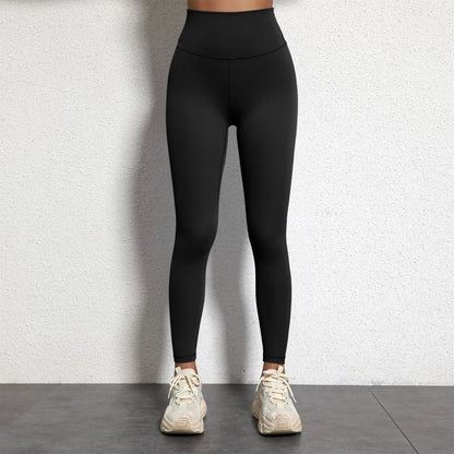 A Model wearing leggings  - Solid Color Classic Soft High Waist Legging  - Women  Sports  Athletic Pants / ghoddosh.com