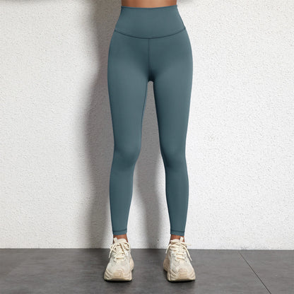 A Model wearing leggings  - Solid Color Classic Soft High Waist Legging  - Women  Sports  Athletic Pants / ghoddosh.com